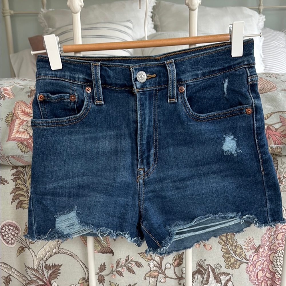 Levi's Blue Jean Shorts Distressed Raw Hem size 26, stretch fabric